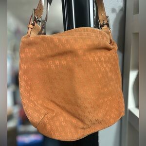 Used but in good condition Dooney and Burke orange bag med size